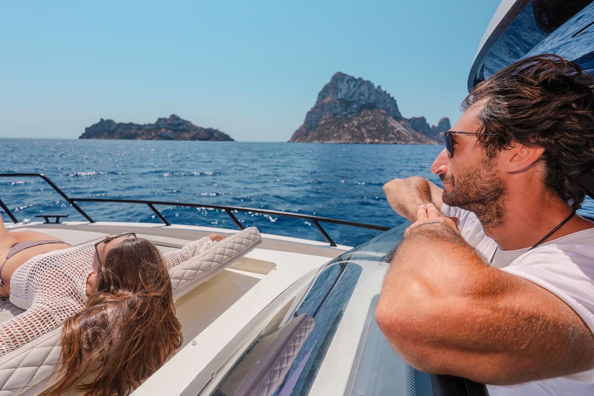 View of Es Vedrà from NAVAN S30 private boat charter Ibiza full-day west coast trip